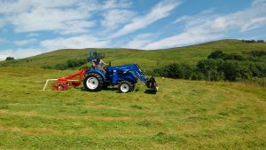making hay with tractor