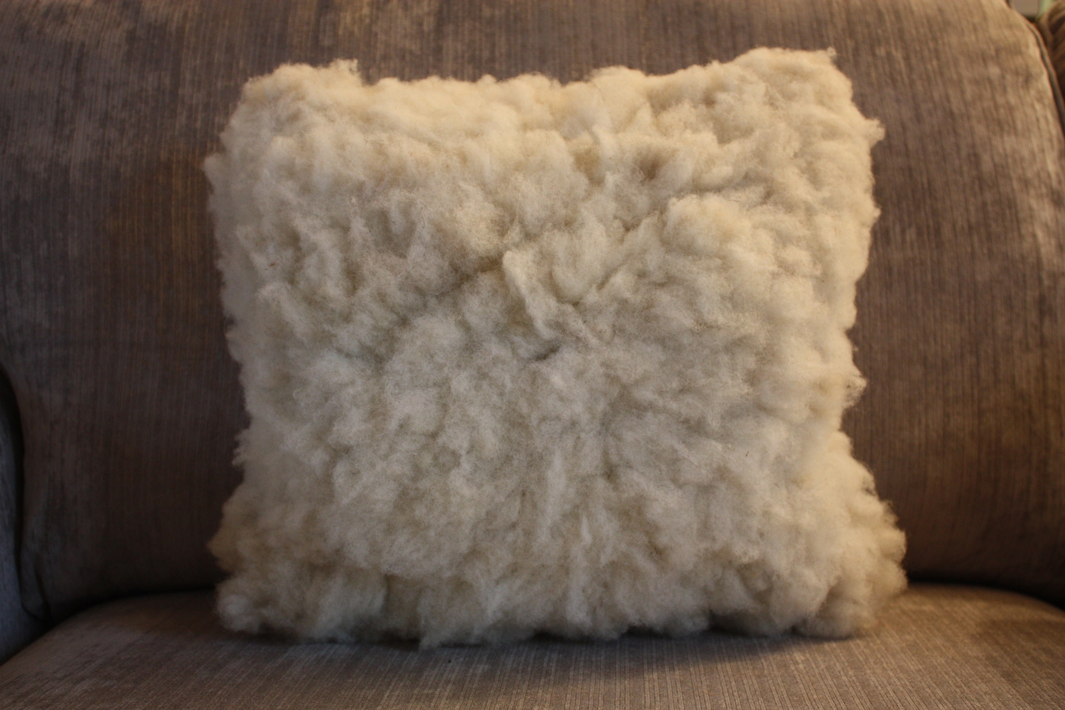 Homegrown, felted fleece “sheepskin” cushion, natural cream – Coloured Ryeland fleece