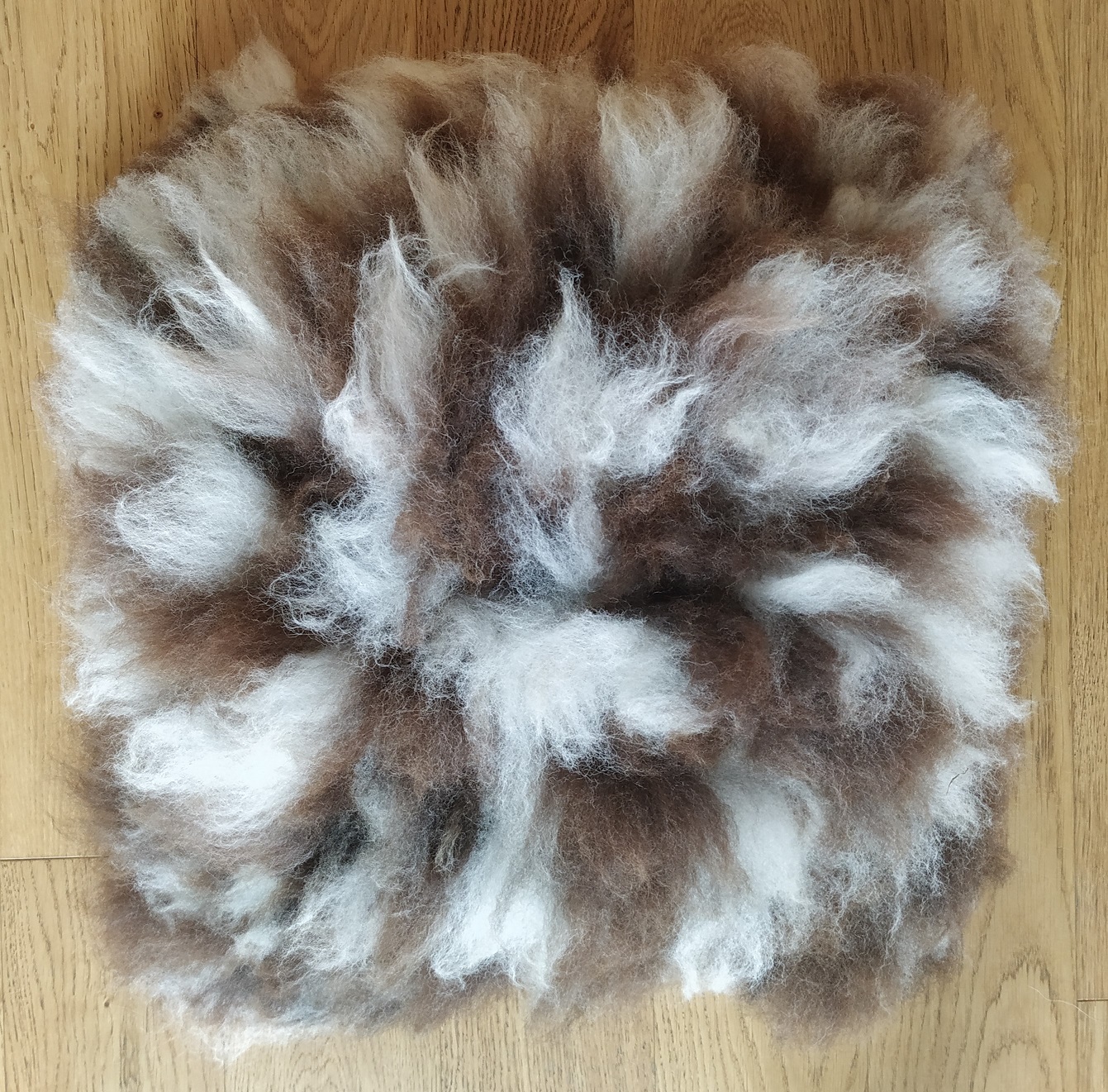 Felted fleece “sheepskin” cushion, natural brown & white – Jacob fleece - 15 x 14 x 5 inches