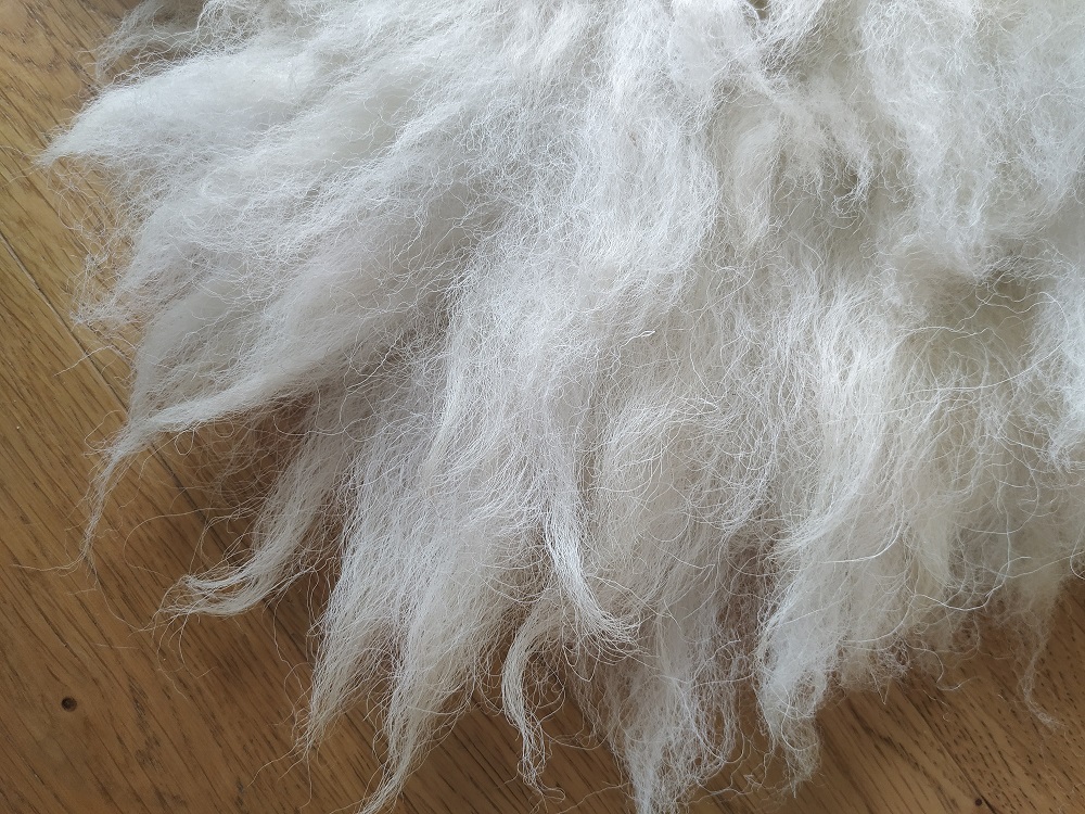 Felted-fleece, sheep-friendly “sheepskin” rug – natural cream – Texel x Herdwick fleece – 28” x 20” - Image 5